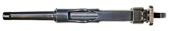 7mm Charola with receiver and bolt held open slightly by the internal mechanism, safety engaged