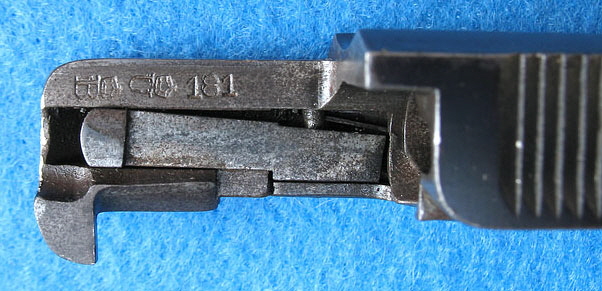 Rear of slide/barrel showing sear