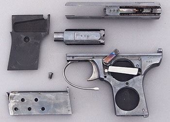 Harrington & Richardson .25 Caliber Self-Loading Pistol - Serial number 520 - Field Stripped