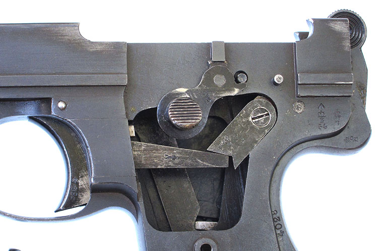 Webley & Scott M1912 .455 Caliber Pistol - SN 4028 - detail of lockwork and slide release button