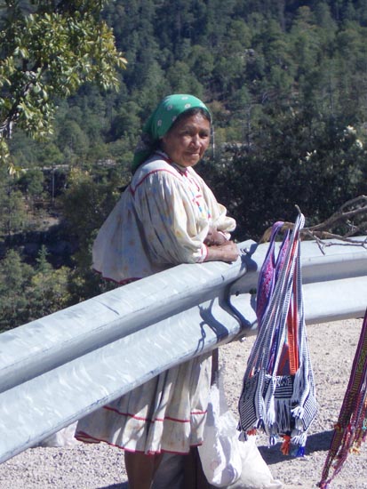 Indian woman selling her weavings